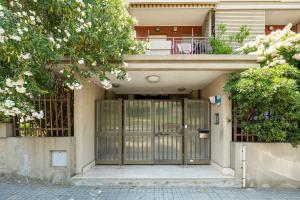 an entrance to a building with a gate at P012 Apartment in Cagliari