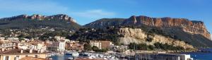 a view of a city with a mountain at Le Bellavista T2 Cassis Emplacement in Cassis