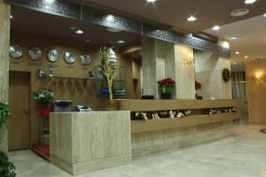 A área de receção ou átrio de Hotel Colosseo & Spa