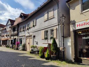 a street in a town with a building at Apartment zu Hofe in Oberursel