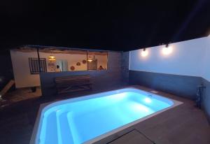 a large swimming pool in a room with at Limón Lunero in Málaga