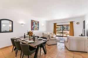 a living room with a table and chairs at Marina park Apartment in Lagos