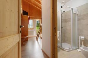 a bathroom with a shower and a sink at Agritur Maso Pan in Caderzone Terme +94 photos