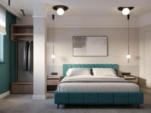a bedroom with a turquoise bed and white walls at Hotel Botika in Kraljevo