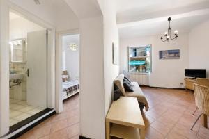 a living room with a couch and a table at Casa Federico in Levanto