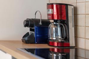 a coffee maker sitting on top of a counter at Ferienhaus Ludava in Hofmarksgasse