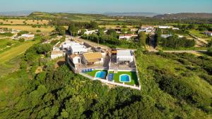 an aerial view of a house on a hill at Casa Bellavistas in Vejer de la Frontera