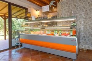 a display case in a restaurant with food at Il Nazareno - Il Gheppio in Cecina