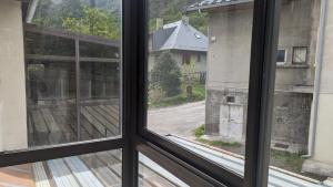 a view from a window of a house at Appartement rochenoir in Saint-Jean-de-Maurienne
