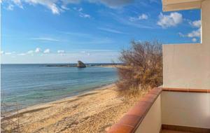 a view of the beach from a building at Mediterranea in Torre Pali