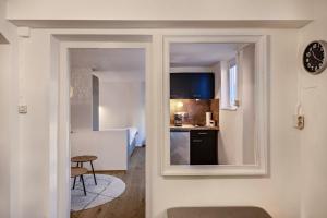 a kitchen with a door leading into a room at Höllental 51 in Garmisch-Partenkirchen