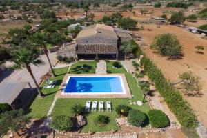 an aerial view of a house with a swimming pool at Finca Fonoll in Santa Margalida