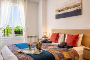 a bedroom with a bed with a table on it at Casa Albatros - Poolside Retreat in Torre-Pacheco +36 photos