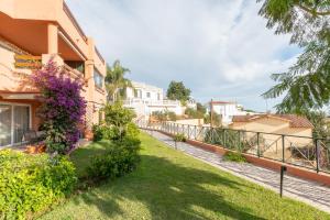 a view of a house with a garden at Fuengirola Hills with Seaview in Fuengirola