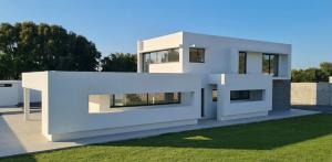 a rendering of a white house at Bella Casa Total House in São Francisco