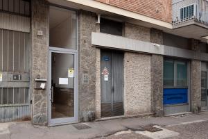 an entrance to a building with a door at De Rolandis in Asti