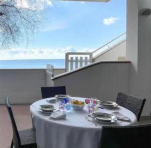 a table with plates and bowls of food on it at Mediterranea in Torre Pali