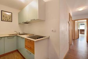 a kitchen with a sink and a counter top at Ferienwohnung Innerwalten 200 in San Leonardo in Passiria