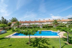 an image of a house with a swimming pool at Montserrat in Miami Platja