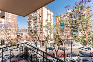 a view from a balcony of a parking lot at Casa de Bella Fuengirola in Fuengirola