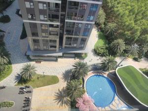 an overhead view of a building and a swimming pool at MH Home in Long Bình