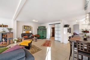 a living room with a couch and a table at Feriendomizil Berta Benzingen 1 in Winterlingen +36 photos