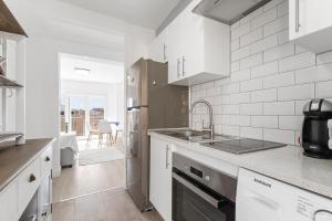 a kitchen with a sink and a counter top at Antogil-mata1 in La Mata
