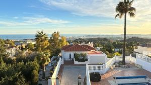 an aerial view of a house with a swimming pool at Casa Montelado in Mijas
