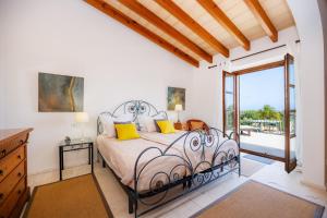 a bedroom with a bed and a balcony at Siesta del Sol in Manacor +37 photos
