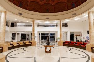 a lobby with couches and a table in a building at Blend Elphistone Resort Marsa Alam in Abu Dabbab +149 photos