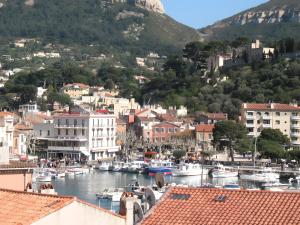 a view of a harbor with boats in the water at T2 Le Bougainvillier Cassis in Cassis +24 photos