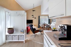 a kitchen and living room with a dining room at Leben am Weinberg in Herbstein