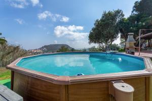 a large swimming pool in auliculiculiculiculiculiculiculiculiculic at La Finca de Teror in Teror