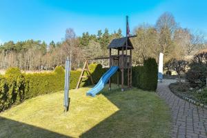 a park with a playground with a slide at Fewo Tanja's Blumenparadies in Hollfeld