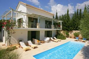 an image of a villa with a swimming pool at Villa Telina Ideales Resort in Kefallonia
