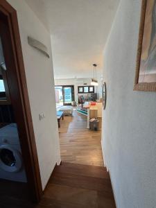 a hallway of a house with a living room at Sardinia house with beautiful view near sea in Brunella