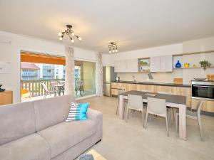 a living room with a couch and a table at New Casa Augusto in Lazise