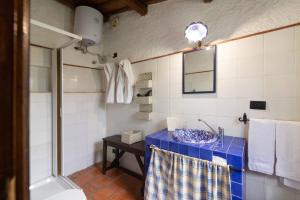 a bathroom with a sink and a toilet and a shower at Tenuta Donna Vittoria in Trapani +92 photos