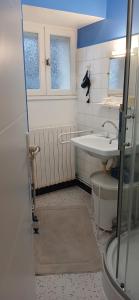 a bathroom with a sink and a toilet at Ma maison du port in Guipry-Messac +29 photos