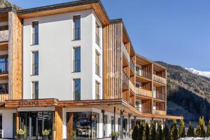 a hotel in the mountains with snow at Stoana Apt 2-1 in San Giacomo