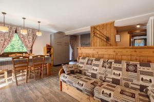 a living room with a couch and a table at Torre St Orso 4061 Maison Gerard in Cogne