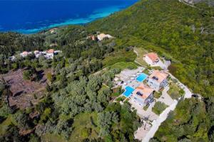 an aerial view of a house on a mountain at Groundfloor Studio 1 in Tsoukalades
