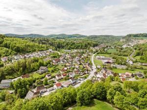 an aerial view of a village in the hills at Ferienwohnung Högenbachtal in Pommelsbrunn