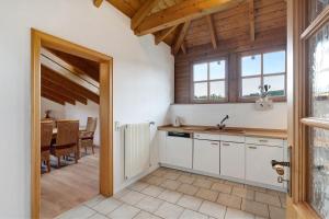 a kitchen with a sink and a table in a room at Felsenland Idyll in Erfweiler +22 photos