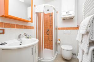a bathroom with a sink and a shower at Orizzonte Damare in Volastra +33 photos