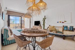 a living room with a table and chairs at Villa Gadea 7-2 in Altea