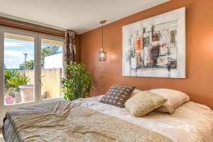a bedroom with a bed and a window at Aux Amelierets in Saint-Just +22 photos