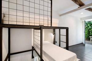 a bedroom with two bunk beds in a room at Beroni su due livelli in Bonassola
