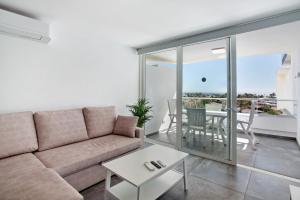a living room with a couch and a table at Tamaran Bureba 511 in Maspalomas