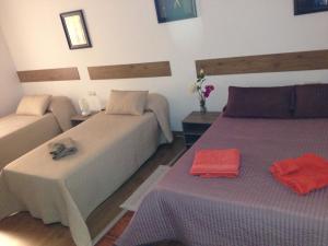 Ліжко або ліжка в номері Hostal Puerto de Santa Maria